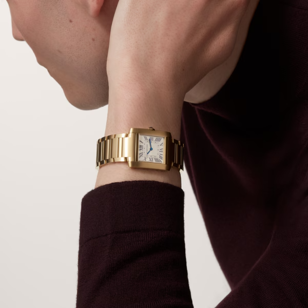 Unworn Cartier Tank Francaise, 18k Yellow Gold, 32mm x 27mm, Ref# WGTA0113, Watch on hand