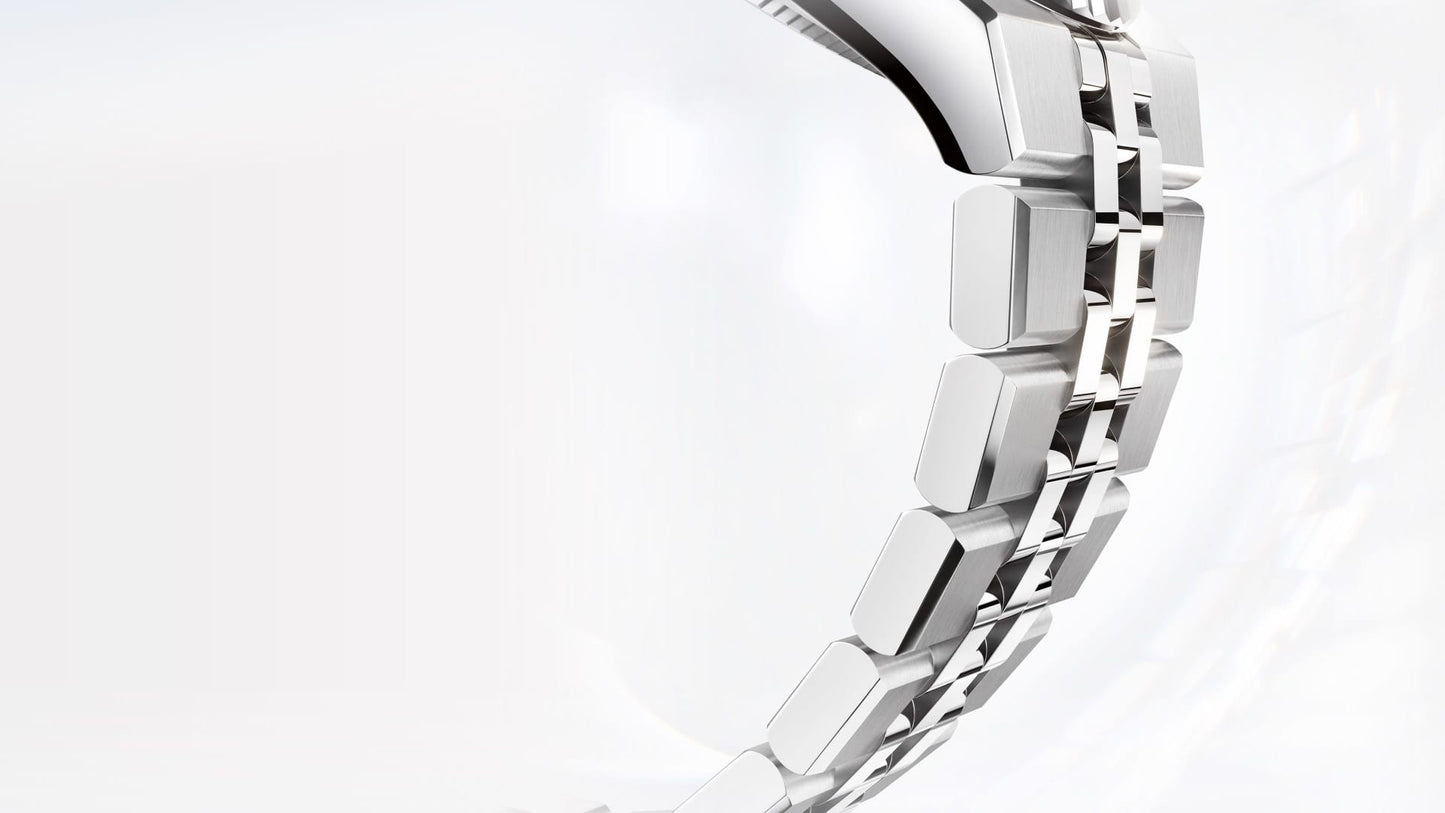 Unworn 2025, Rolex Land-Dweller 40, Oystersteel and 18k White Gold, Intense white dial, Fluted Flat Jubilee, Ref# 127334-0001, Bracelet