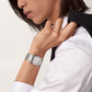 Unworn Cartier Tank Francaise de Cartier, Medium Stainless Steel, 32mm x 27mm, Ref# WSTA0074, Watch on hand