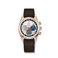 Zenith chronograph watch with a rose gold case, black leather strap, and three color dials.