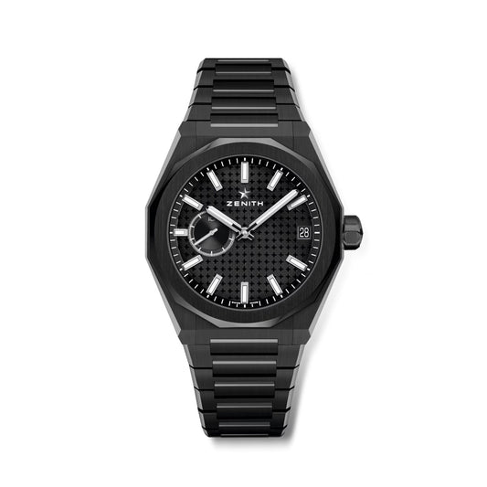 Black Zenith watch with an octagonal case, textured dial, and silver hands. Date displayed at 3 o'clock.