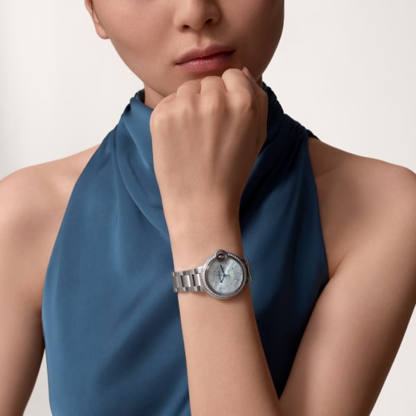 Unworn Cartier Ballon Bleu de Cartier, Stainless Steel and Diamonds, 33mm, Ref# W4BB0028, watch on hand