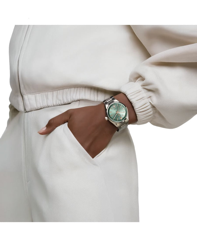 TAG Heuer Carrera Calibre 7 Date Automatic, Stainless Steel and 18k Rose Gold, 36mm, Ref# WBN2312.BA0001, Watch on women hand