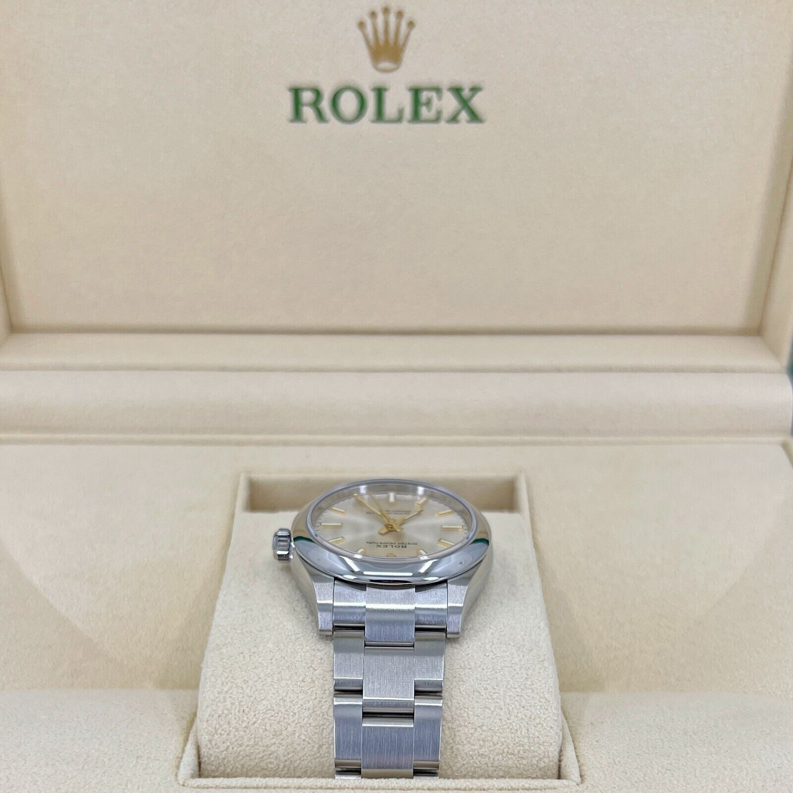 Rolex Oyster Perpetual Oystersteel, 31mm, Silver Dial, Ref# 277200-0001, Side 1