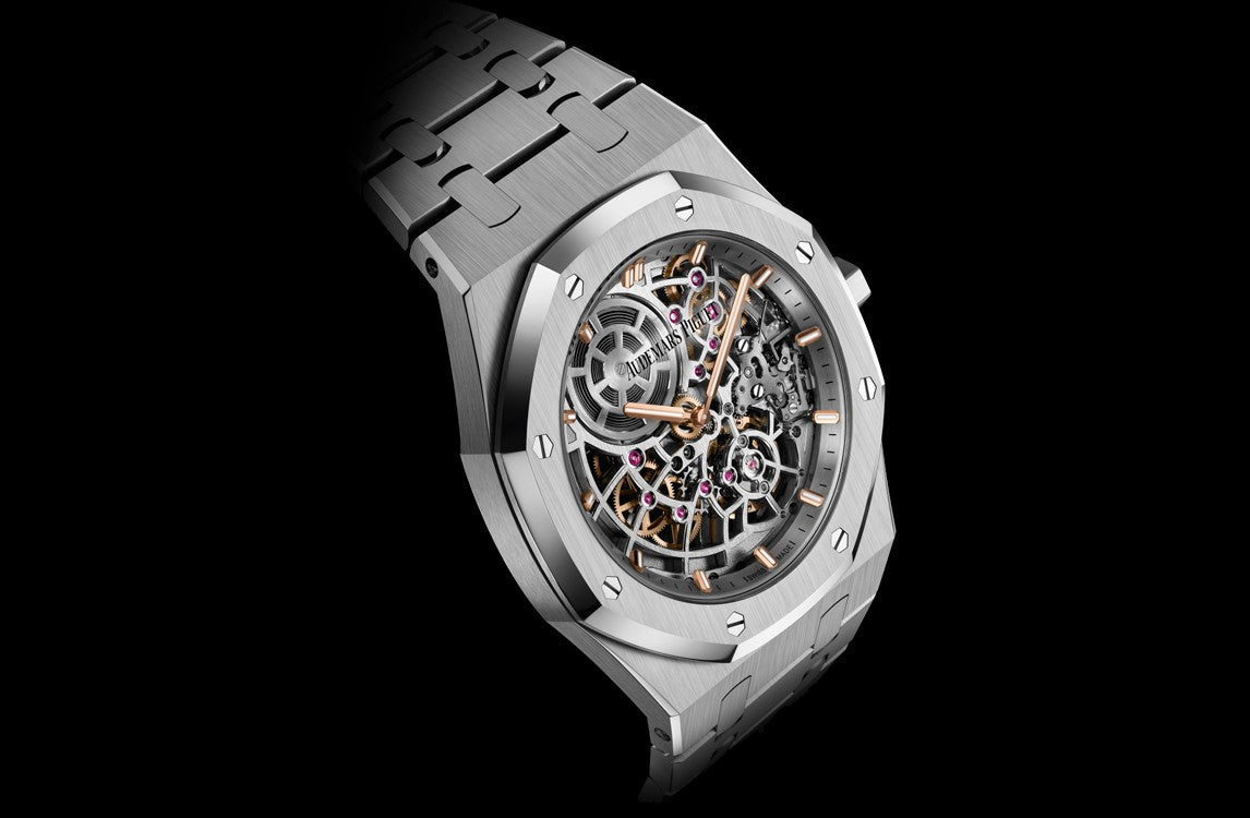 Side Audemars Piguet Royal Oak "JUMBO" EXTRA-THIN OPENWORKED "50TH ANNIVERSARY" Ref# 16204ST.OO.1240ST.01